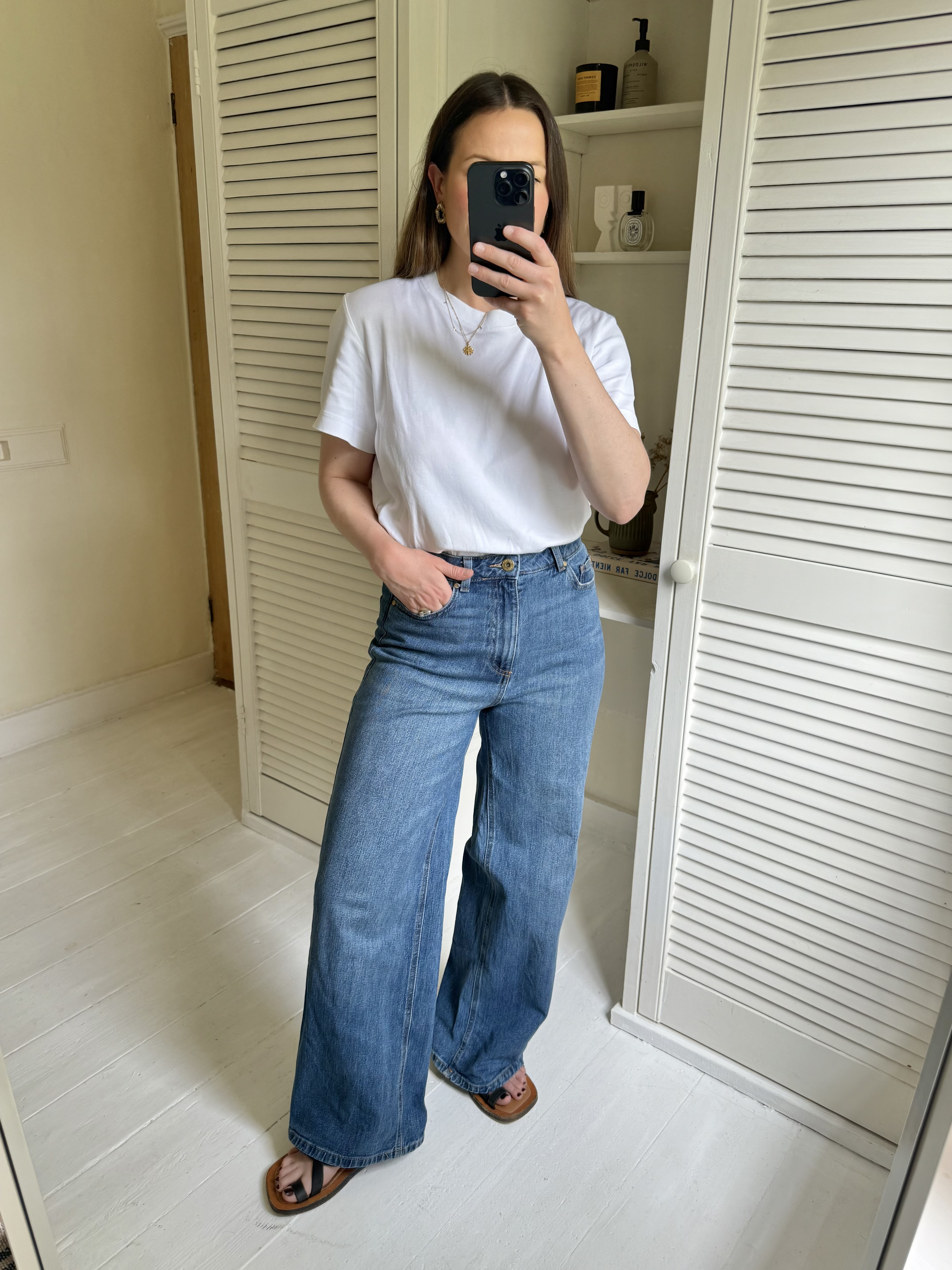 Woman tries on M&amp;S Wide Leg Jeans