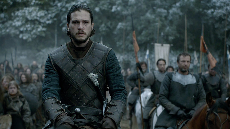 Jon Snow (Kit Harington) mounted on horseback with a small force at his back in Game of Thrones