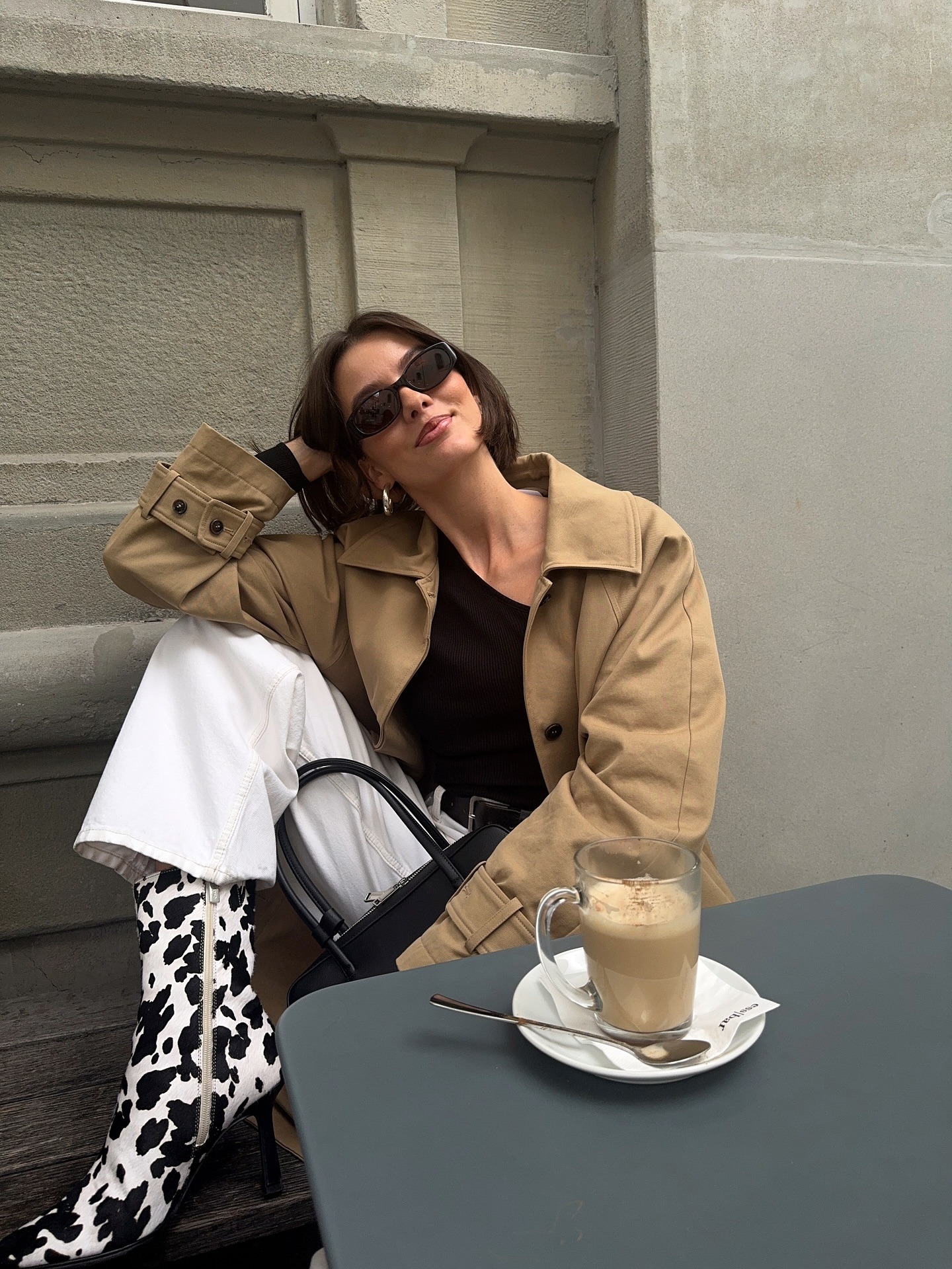 @maryljean wears a cropped trenc, white denim, and a pair of calf-hair shoes.